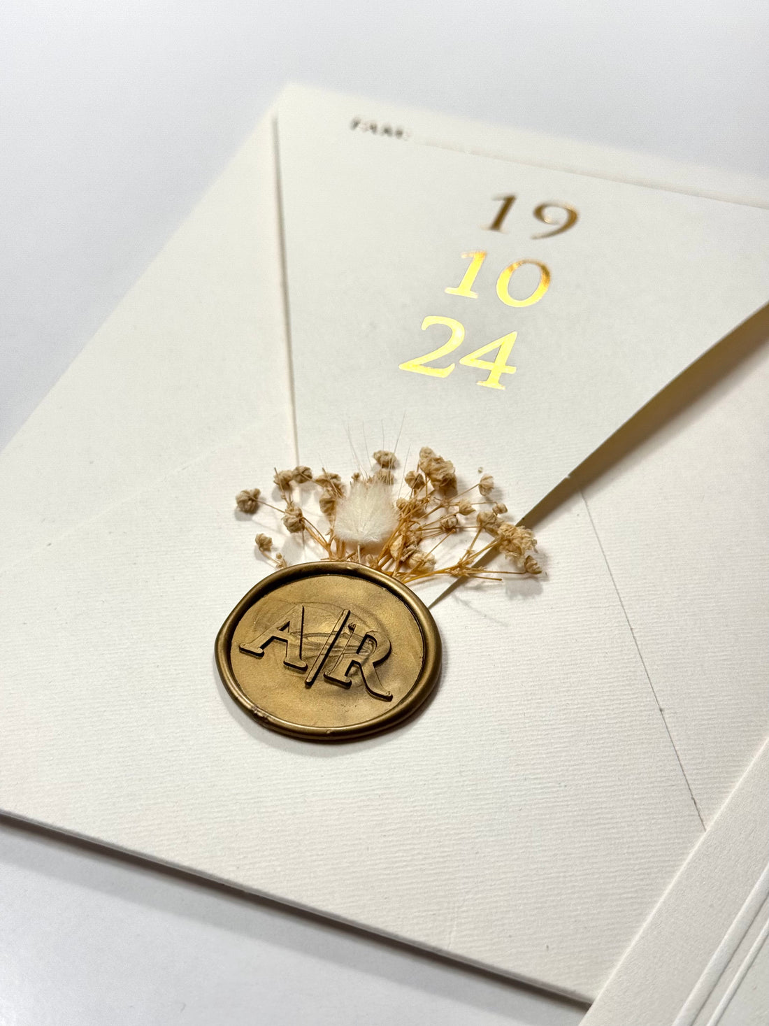 Sealed Floral Wedding Invitation: Elegant White & Gold Card