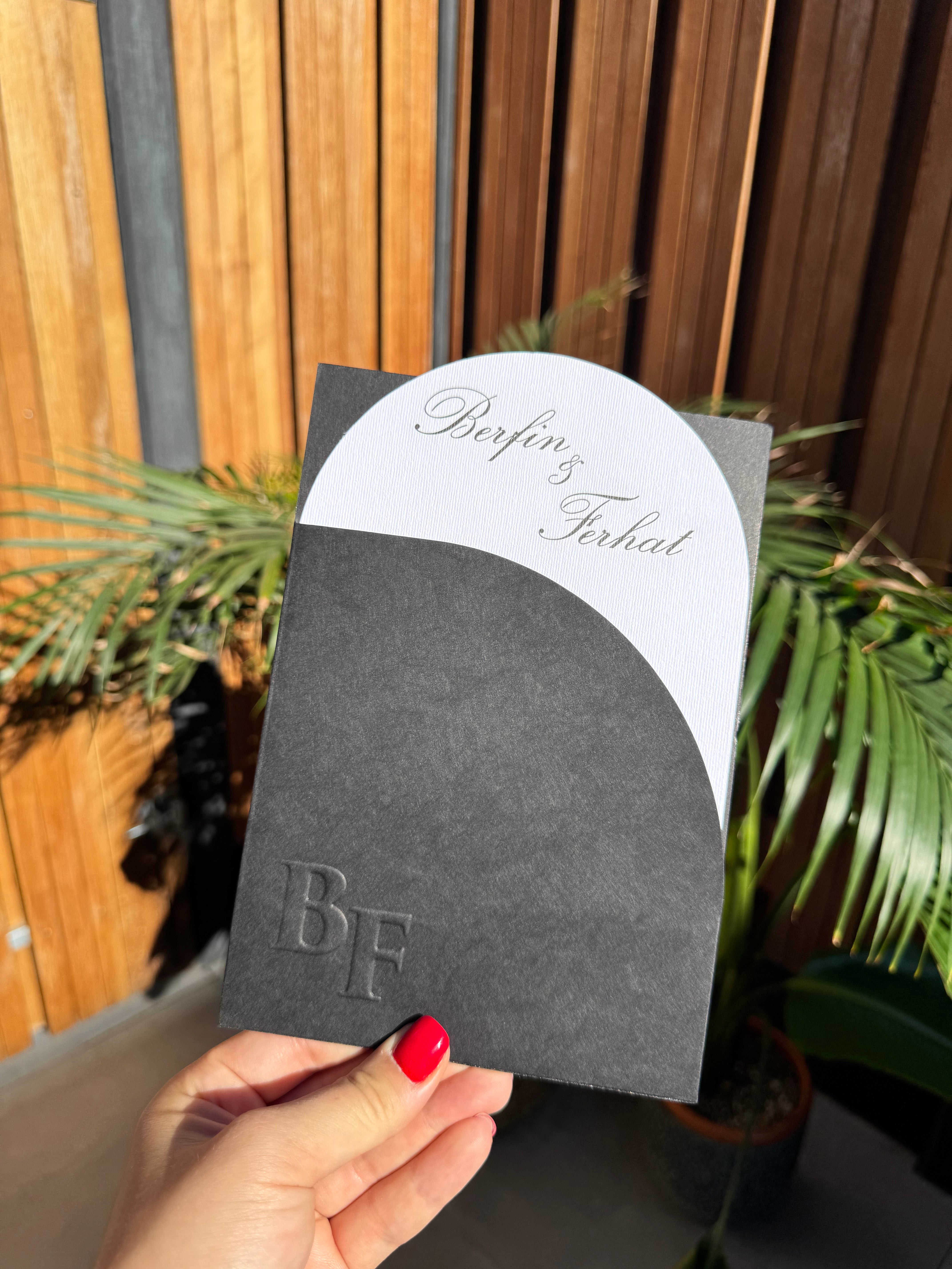 Black Embossed Envelope and White Classic Wedding Invitation