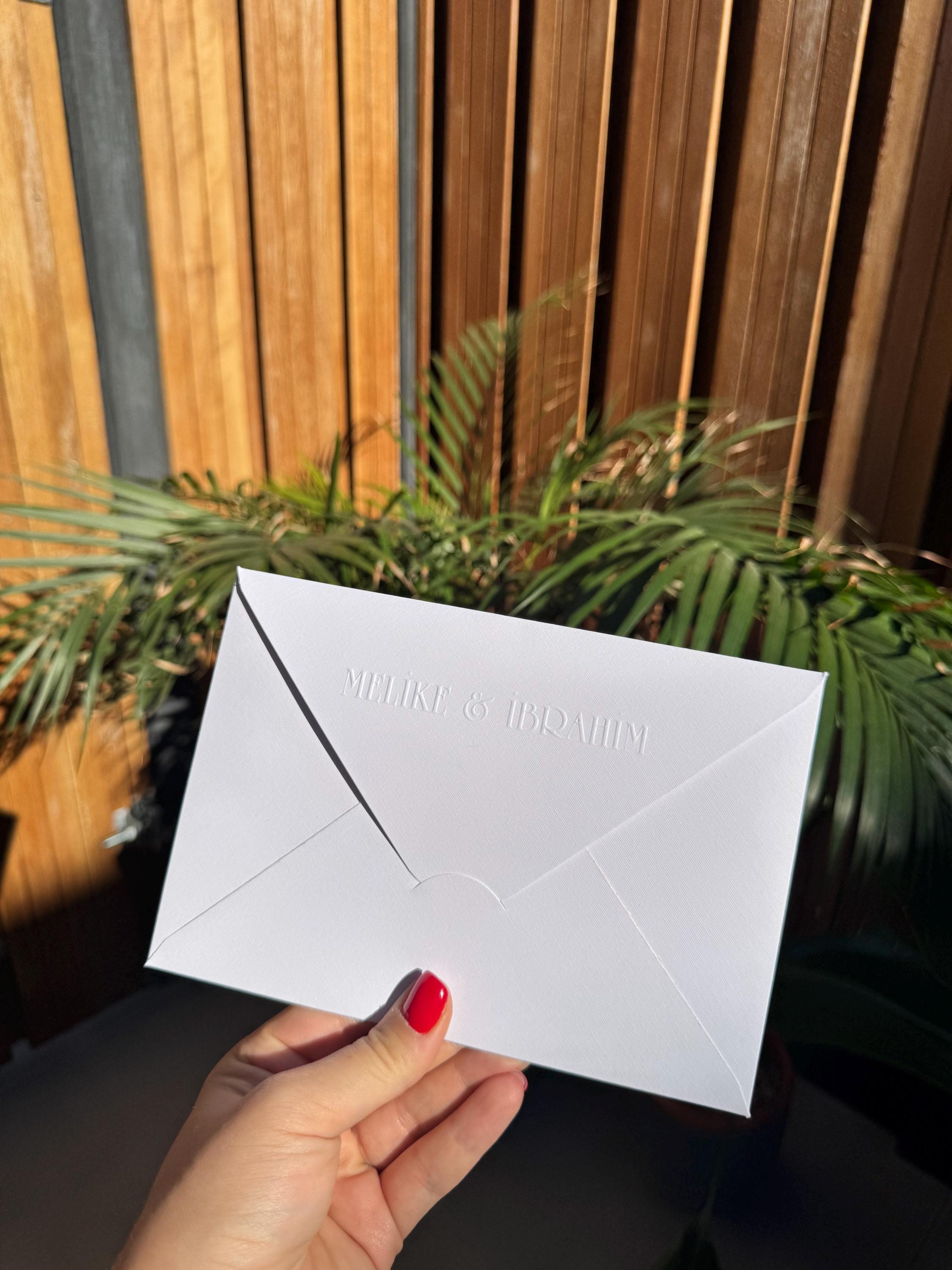 White Embossed Elegant Wedding Invitation