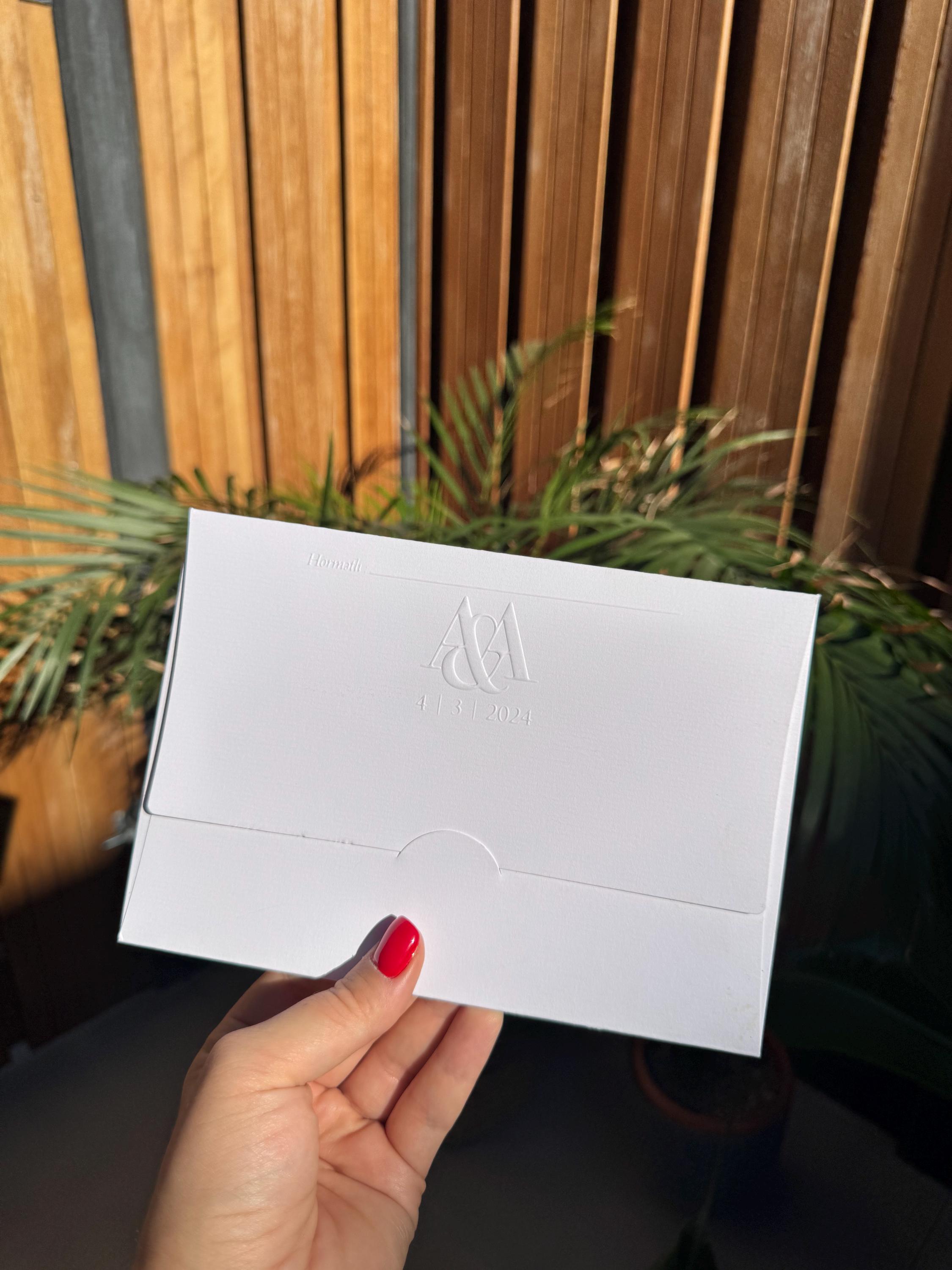 Transparent Modern Wedding Invitation With White Embossed Text