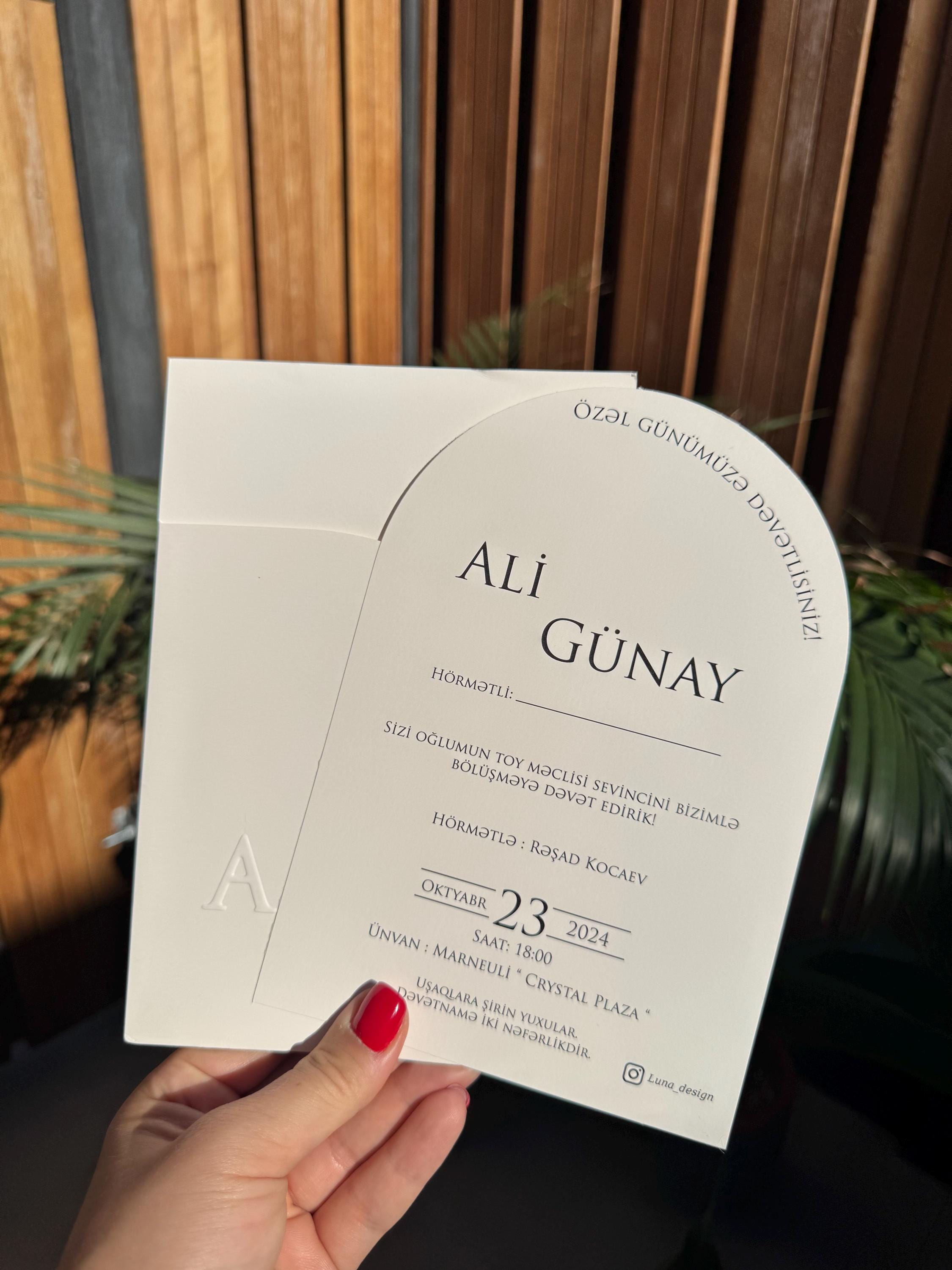 White Classic Initial Embossed Modern Wedding Invitation