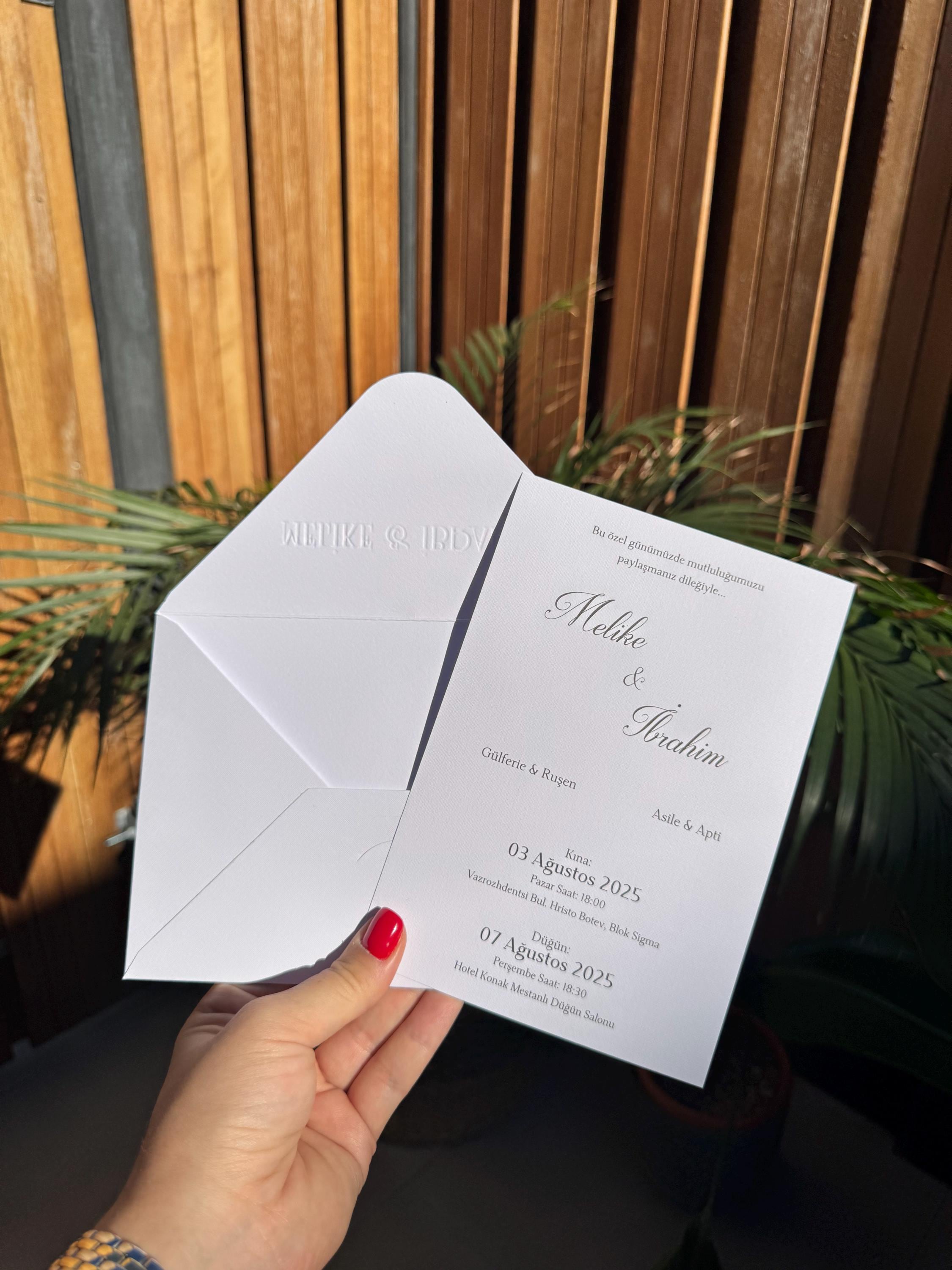 White Embossed Elegant Wedding Invitation