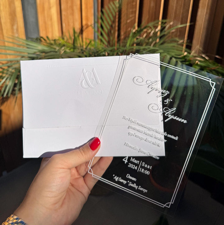 Transparent Modern Wedding Invitation With White Embossed Text