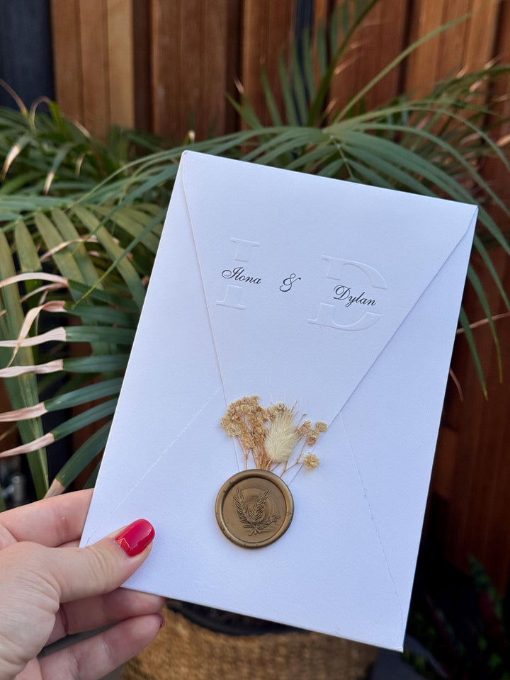 White Embossed Wedding Invitation With Floral Wax Seal Elegant Design