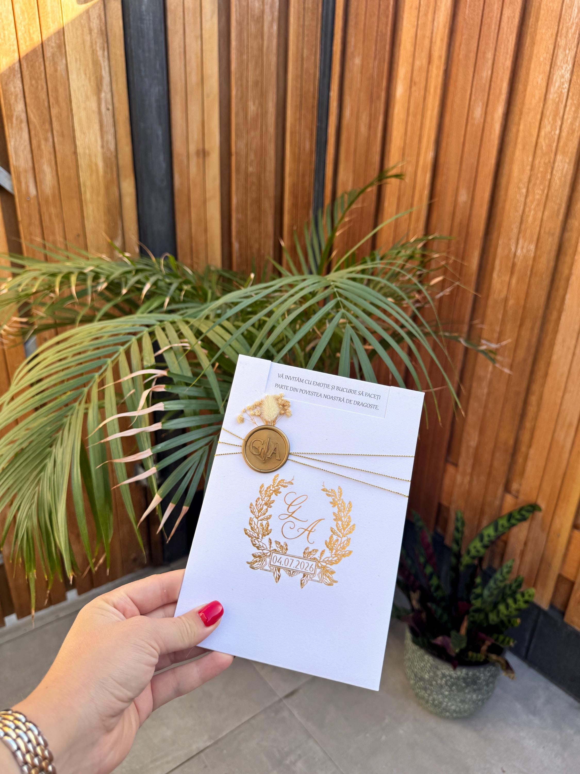 White Wedding Invitation With Gold Lettering Floral Wax Seal And Chain
