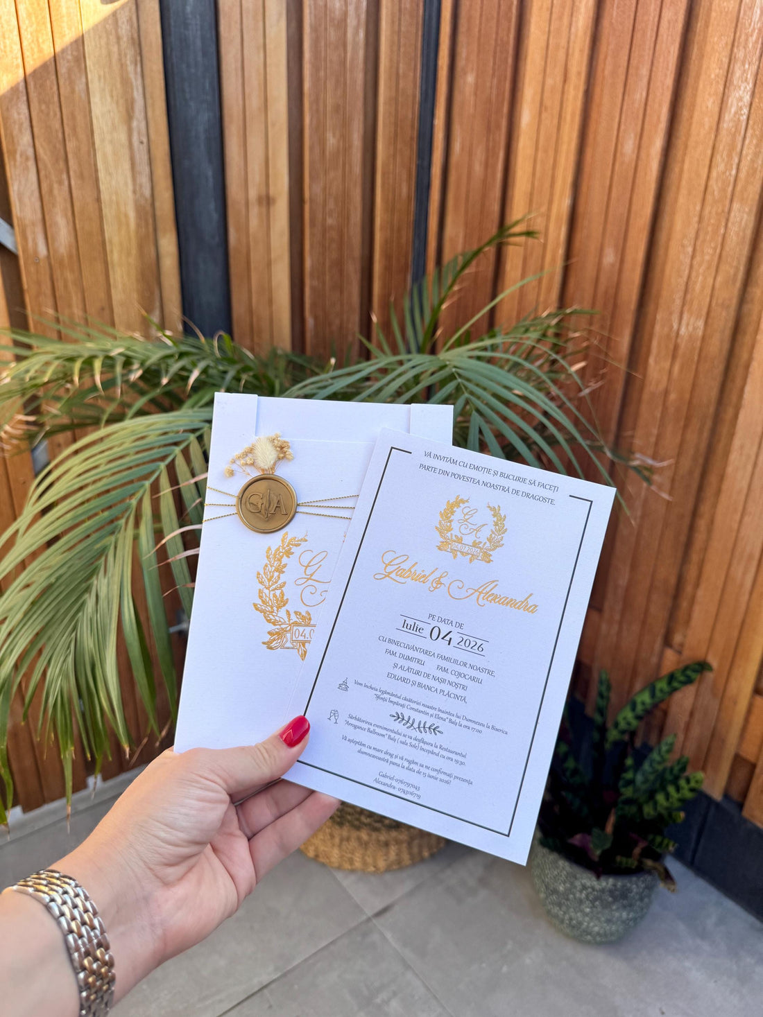 White Wedding Invitation With Gold Lettering Floral Wax Seal And Chain