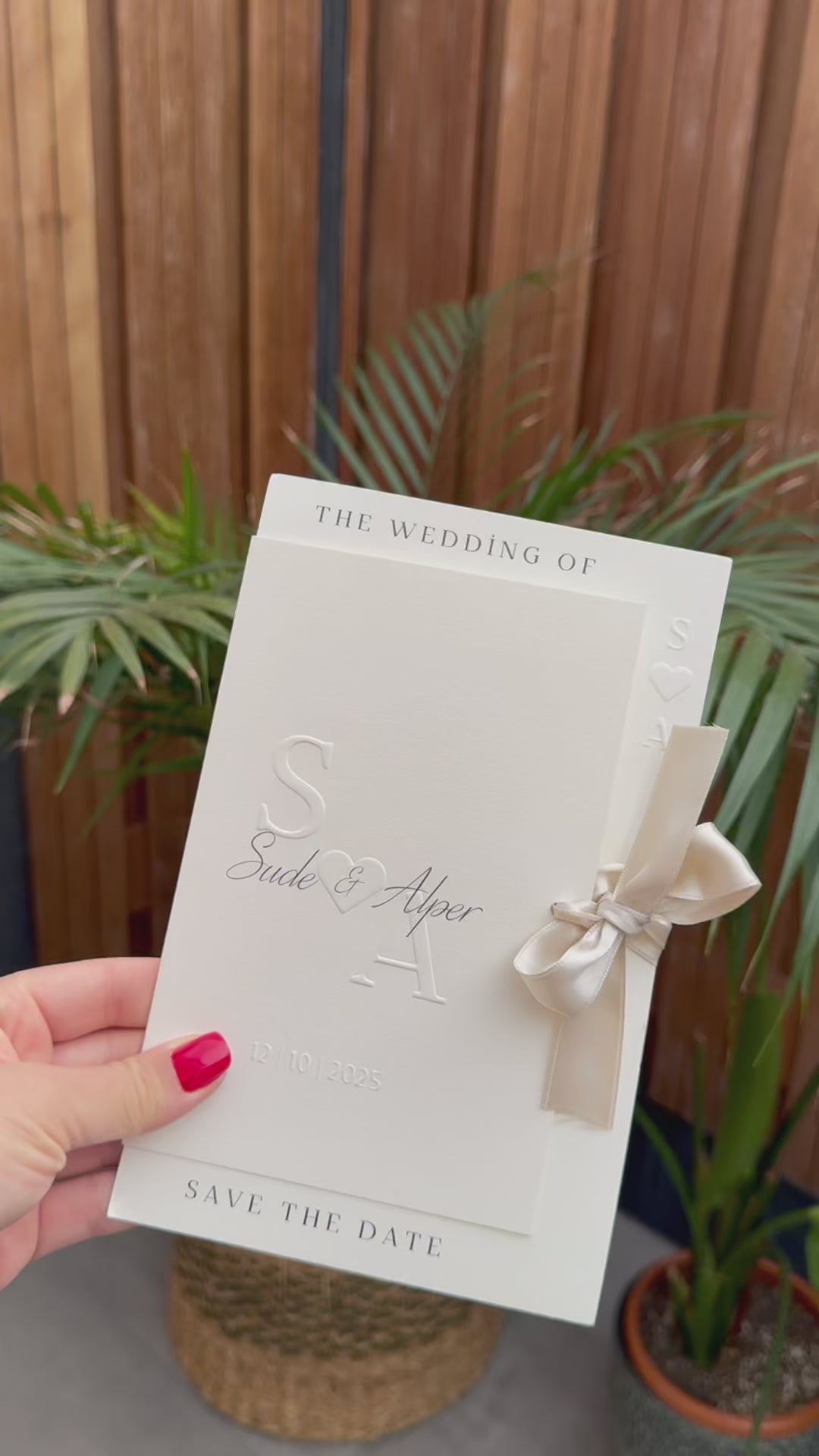 Cream Modern Wedding Invitation With White Ribbon Embossed Text